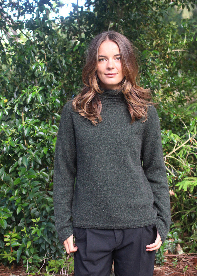 Moss Merino Possum Turtle neck jersey with neck, cuff and hem detail.