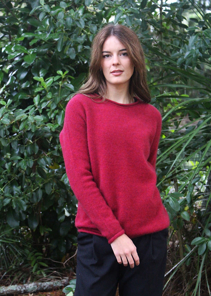 Raspberry crew neck Merino Possum jersey. Classic light weight yet warm.