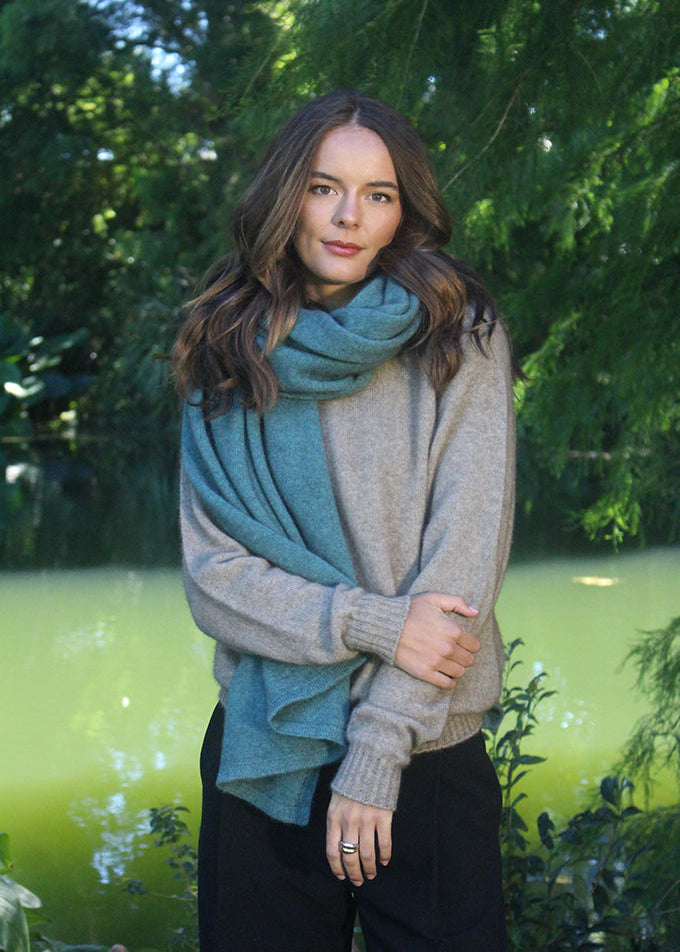 Sage  Brando Poncho worn several ways super versatile.