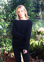 Black Merino Possum Jersey knitted on a larger needle, this is a looser knit
light as a feather. Crew neck, gently curving ribbed hem
and looser cuffs 