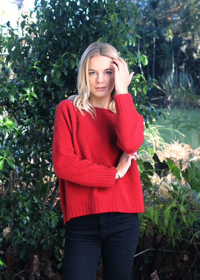 Red Merino Possum Jersey knitted on a larger needle, this is a looser knit
light as a feather. Crew neck, gently curving ribbed hem
and looser cuffs 