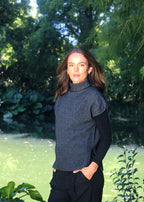 Charcoal Lothlorian entwine vest, with rib hem , rolled sleeve and turtle neck. A twist on the classic vest. 