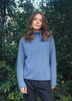 Light Blue Merino Possum Turtle neck jersey with neck, cuff and hem detail.