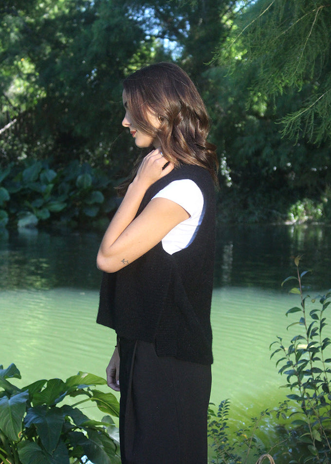 Black merino possum Ride Vest. A classic and timeless garment worn over as shirt or t-Shirt 