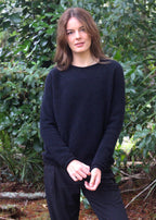 Black crew neck Merino Possum jersey. Classic light weight yet warm.