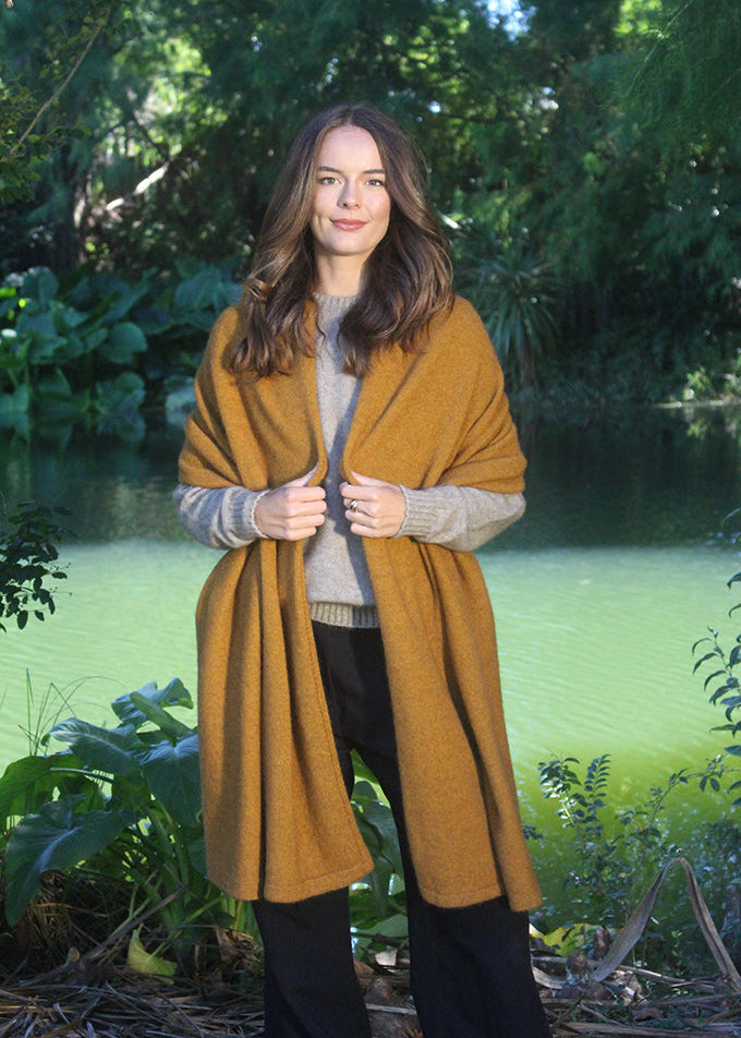 Gold Brando Poncho worn several ways super versatile.