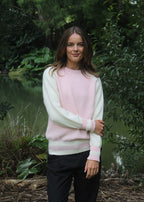 Blush crew neck with natural sleeves, 100% Alpaca jersey. Ribbed cuffs and hem .