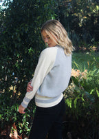 Dove 100% baby alpaca crew neck jersey  with ribbed cuffs and hem 