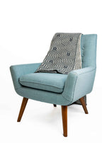 Koru Jacquard Throw

Possumsilk Collection™
A beautiful two-toned jacquard throw in a
multi-textured pattern.
This lovely, soft throw works well for both
home and travel.
YARN BLEND
65% Merino Wool
25% Possum Fur
10% Silk.
ONE SIZE—Approx. 130cm wide x 125cm long

KO965